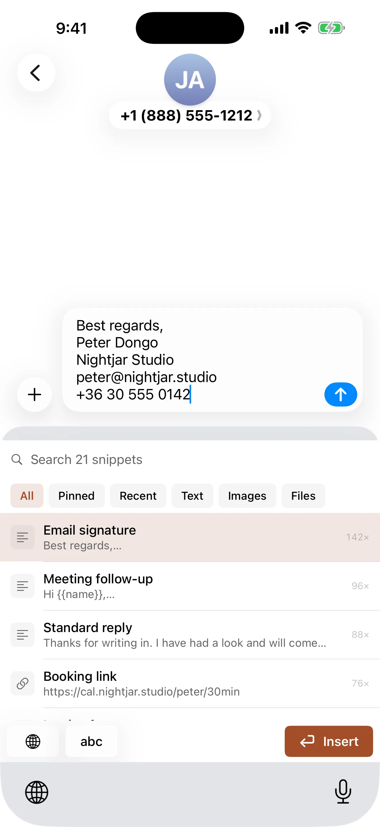 The Fingertips keyboard extension inserting a signature on iPhone